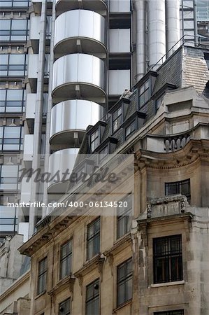 Contrast of modern (the Lloyds Building) and traditional commercial architecture on Cornhill in London's financial district.