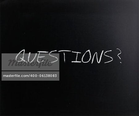 "Questions?" handwritten with white chalk on a blackboard.