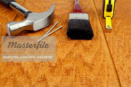 Assorted work tools on wood