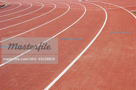 white curved lines of race tracks on stadium