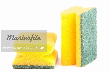 Yellow kitchen sponges isolated over white background
