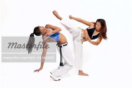 Girls performing Brazilian martial art dance - Capoeira