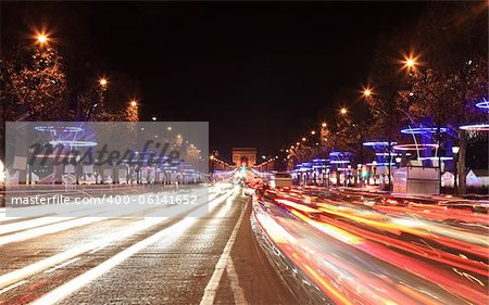 December illumination and traffic lights on the Avenue des Champs-Élysées in Paris,Europe.