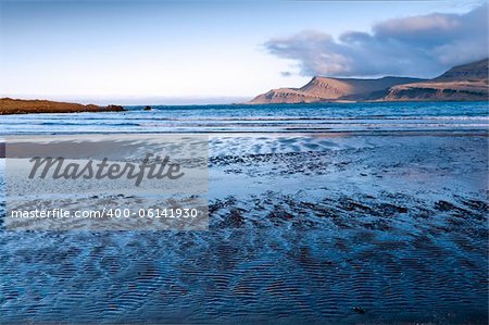 The outflow of sea in the bay, east coast, Iceland