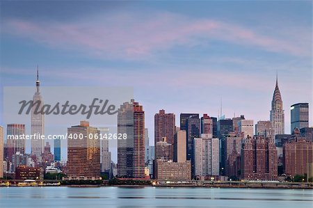 Manhattan skyline viewed from Queens at twilight.