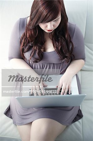 Woman Using Laptop
