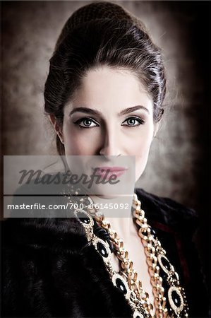 Portrait of Woman Wearing Gold Chains