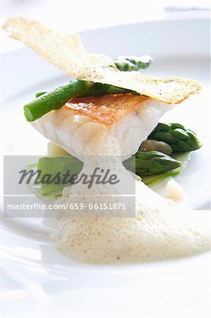 Sea bass with asparagus and crab foam