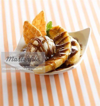 Banana Foster with Vanilla Ice Cream, Wafer Cookies and Caramel Sauce