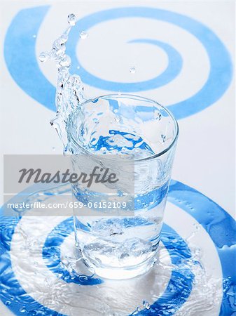 Water Splashing into a Glass Water Splashing into a Glass