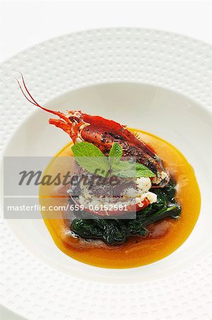 Lobster curry with spinach in mango soup (Asia) Lobster curry with spinach in mango soup (Asia)