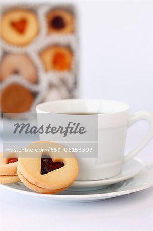 Linzer Tart Cookies with a Cup of Coffee