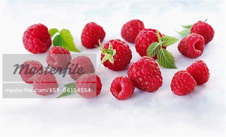 Fresh raspberries with leaves