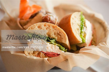 Mozzarella, Tomato and Romaine Sandwiches on Ciabatta; In Paper Lined Basket