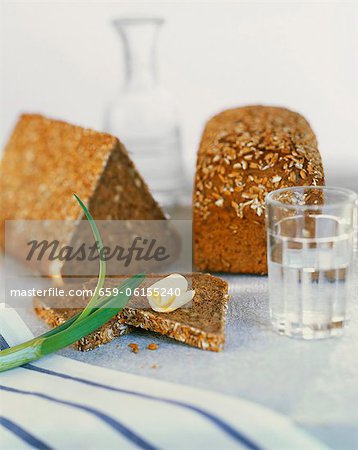 Wholemeal bead and a slice with a curl of butter