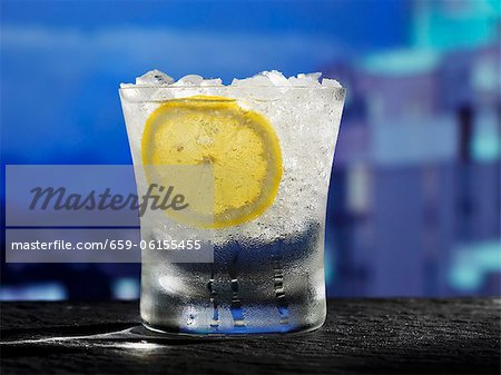 Glass of Water with Crushed Iced and a Slice of Lemon