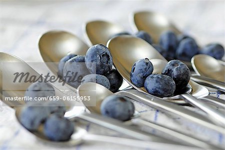 Spoons with blueberries