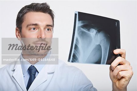 Doctor examining x-ray