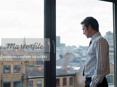 Businessman looking at urban landscape