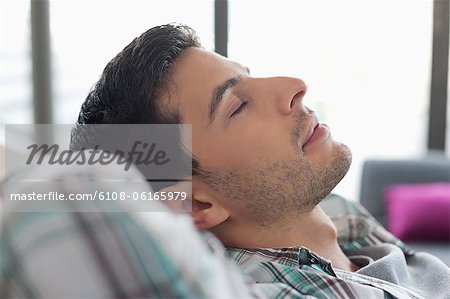 Close-up of a man sleeping