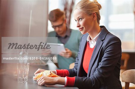 Businesswomen having lunch in a restaurant