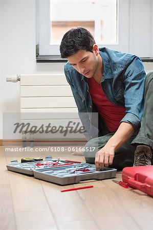 Technician arranging his toolbox