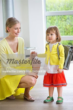 Little girl getting ready for school