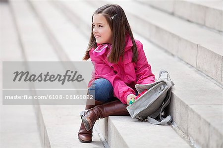 Girl opening her schoolbag