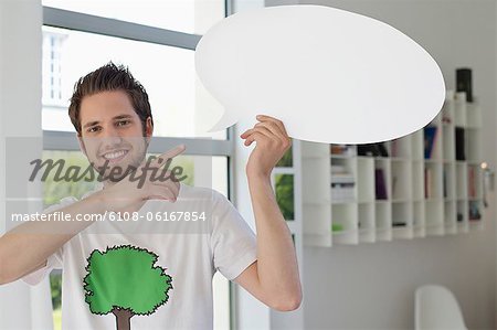 Man holding a speech bubble