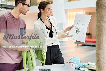 Fashion designers working in an office