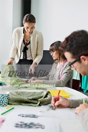 Fashion designers working in an office