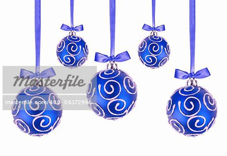 Blue Christmas balls with bows on white background