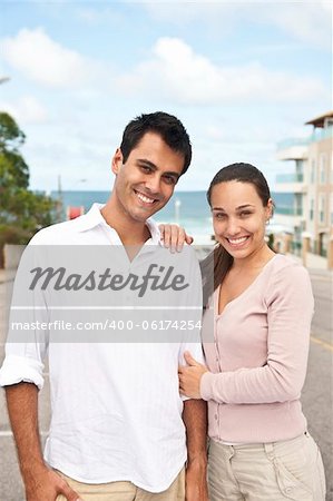 portrait of a hispanic couple in love outdoors