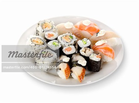Sushi and rolls in a plate isolated on a white background. Clipping path