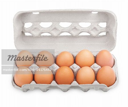 Ten brown eggs in a carton package isolated on white