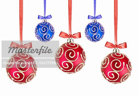 Red and Blue Christmas balls with bows on white background