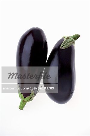 Two Whole Eggplant on a White Background