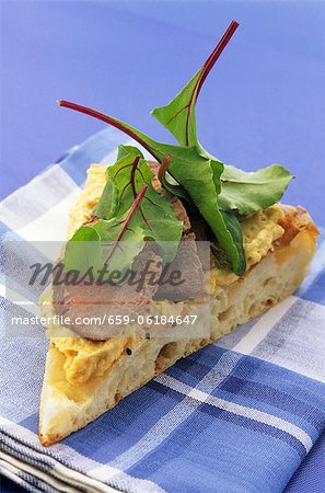 Flat bread with hummus and meat