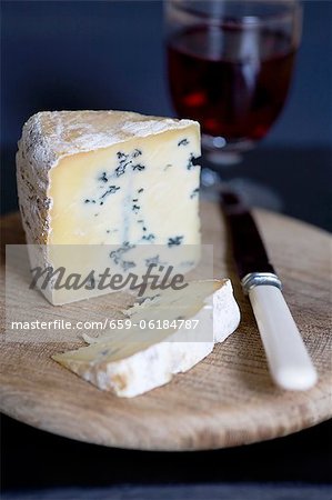 A piece of blue cheese (type: Mrs Temple's Binham Blue, Norfolk, UK)