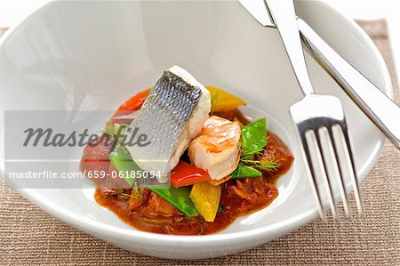 Branzino (sea bass) and prawns with vegetables (sweet and sour) Branzino (sea bass) and prawns with vegetables (sweet and sour)