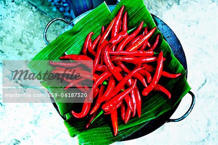 Thai chilli peppers on banana leaves