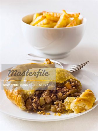 Beef pasty with french fries (England)