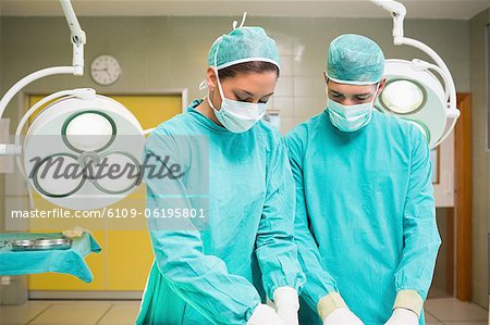 Two surgeons working