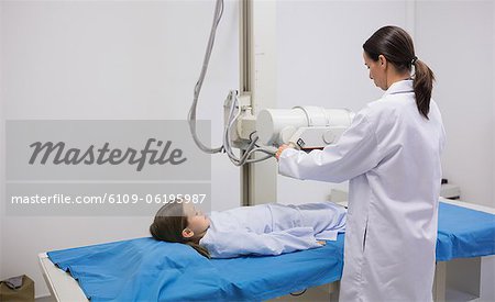 Doctor doing a radiography on a girl