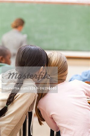 Students talking during lesson