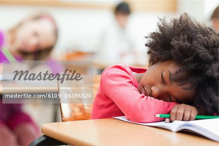 Little girl sleeping during class