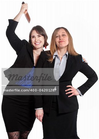 Smiling woman holds a knife behind clueless coworker
