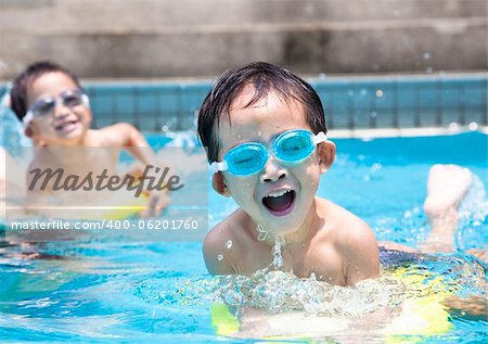 asian boy in swimming pool