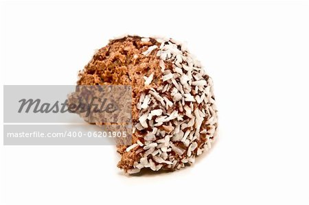 A half eaten chocolate ball isolated on a white background