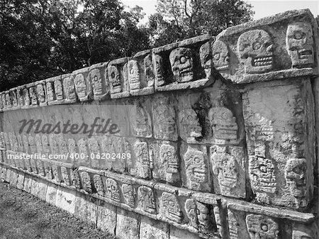 Chichen Itza - the main pyramid El Castillo also called The Temple of Kukulcan. This is one of the new 7 wonders of the world. Located in the Yucatan Peninsula of Mexico. The wall of skulls was the place to hang the heads of defeated or sacriificed warriors.